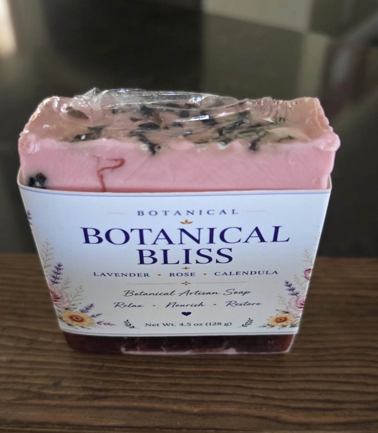 Botanical Bliss Lavender, Rose and Calendula botanical artisan soap in its labeled packaging